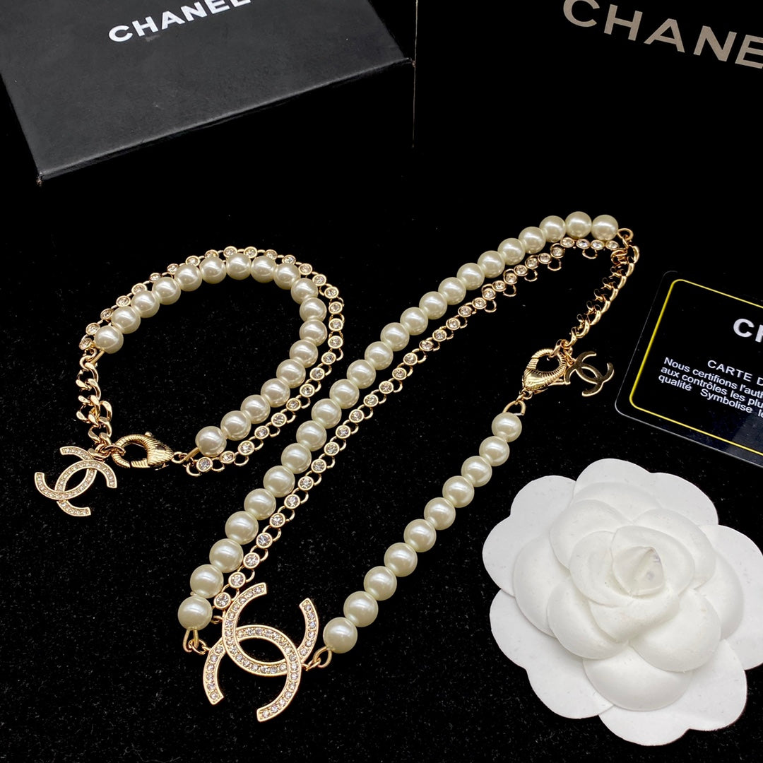 Luxury pearl and diamond necklace + bracelet